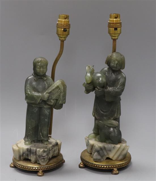 A pair of Chinese soapstone figural lamps
